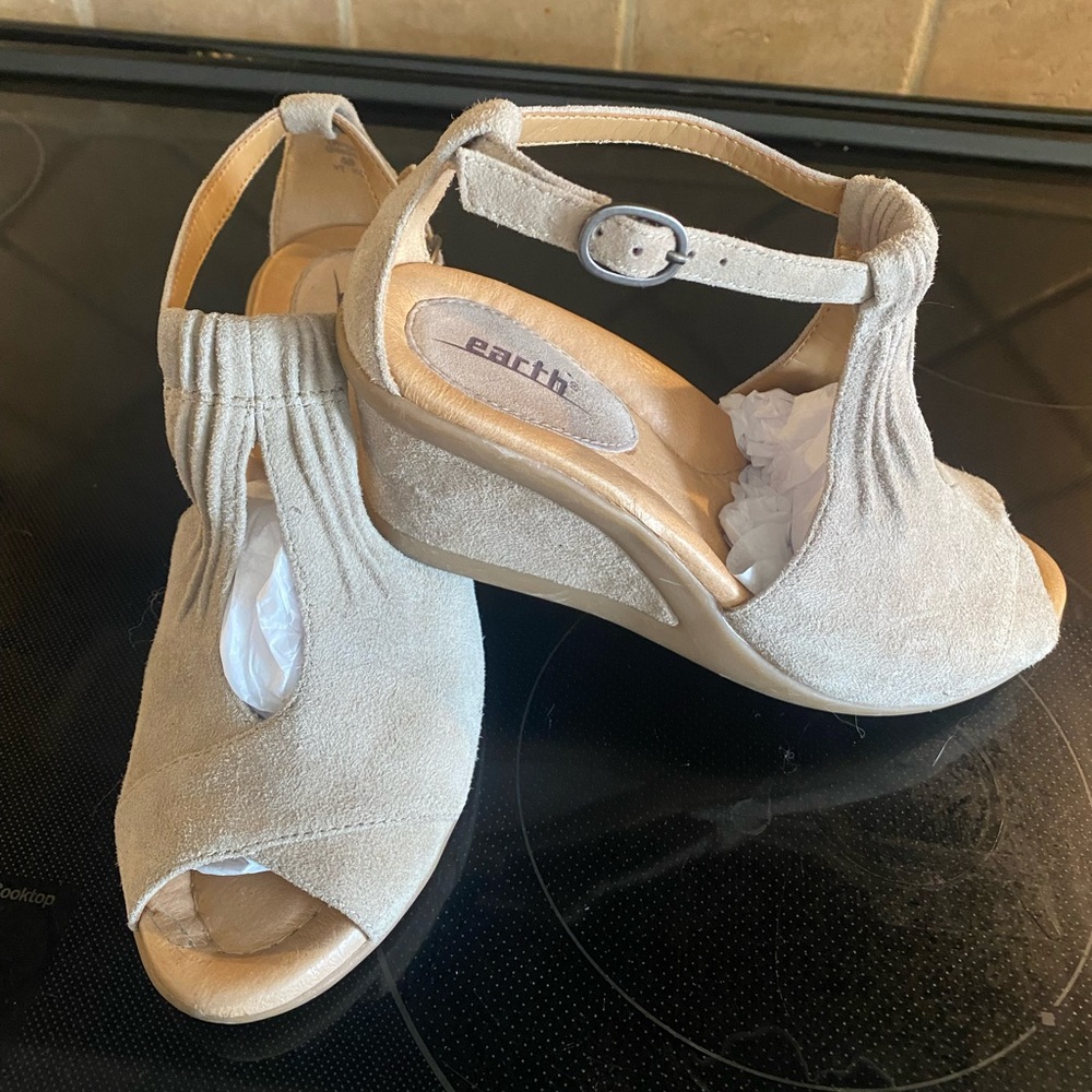 Earth suede sandals with wedge heel